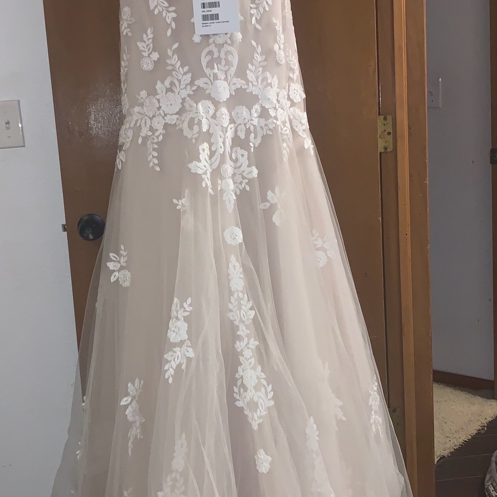 NWT wedding dress. Never used. Maggie Sottero